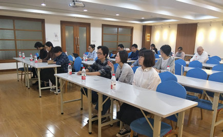 劉潭服裝接待良品公司員工參觀考察學習