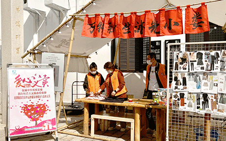 春風送暖，花香滿城，劉潭服裝廠參加公益義賣活動